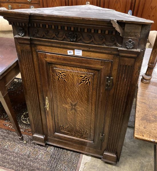 A late 18th century inlaid oak hanging corner cupboard, width 77cm depth 43cm height 108cm